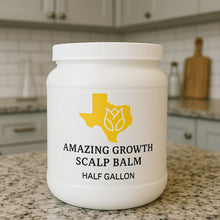Load image into Gallery viewer, Half-gallon jar of Amazing Growth Scalp Balm on a modern kitchen lab counter with Texas logo label