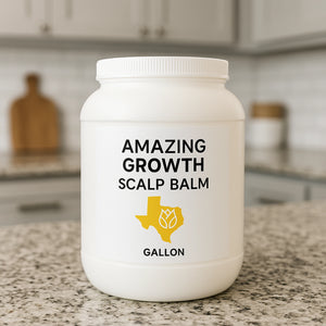 One-gallon jar of Amazing Growth Scalp Balm on a granite kitchen counter with Texas logo label
