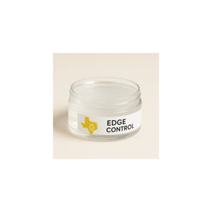 Clear Edge Control jar with black cap – premium wholesale beauty supply product.