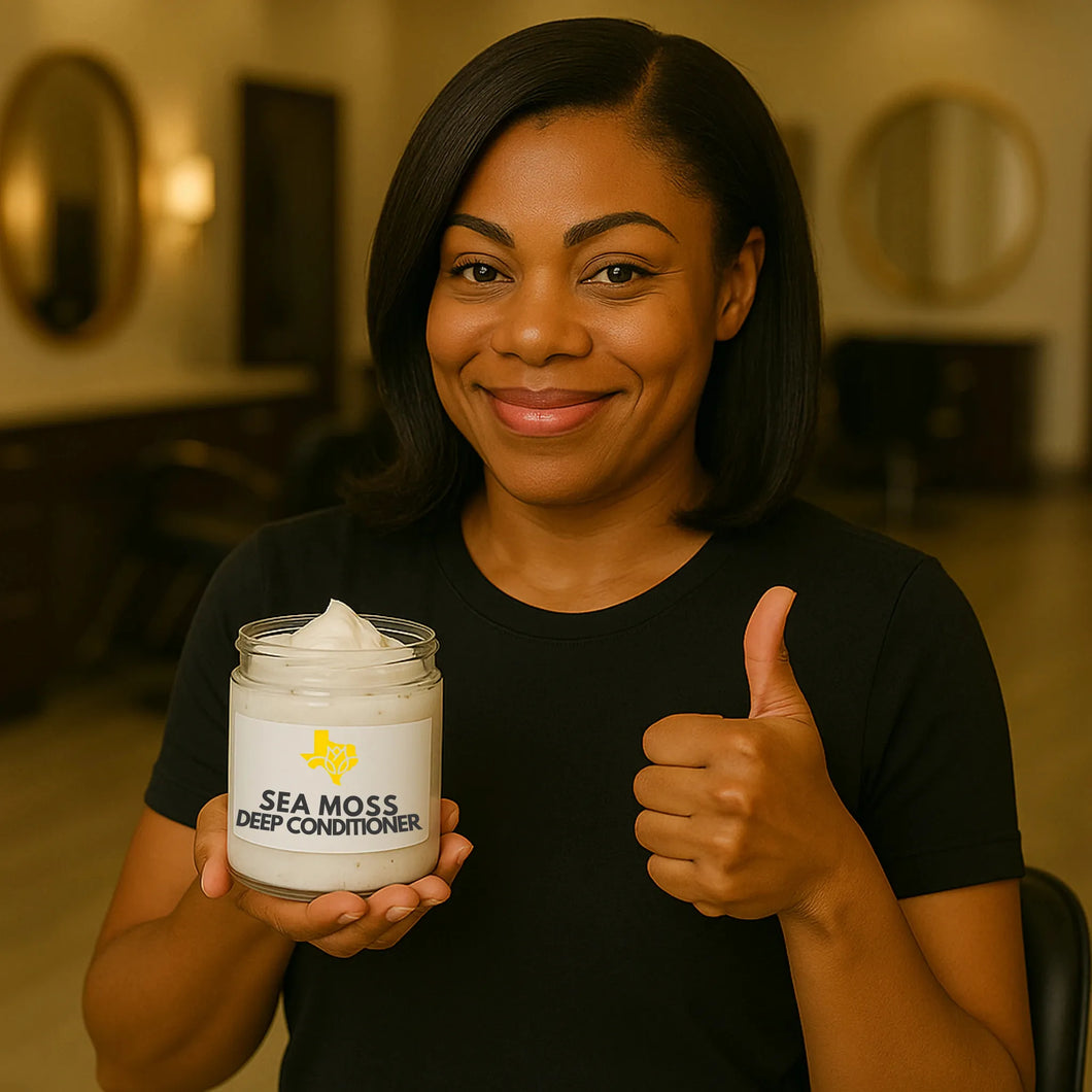 African American hairstylist holding Sea Moss Deep Conditioner by TexasWNBS in upscale salon, smiling and giving thumbs up.